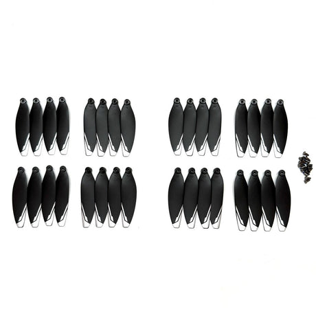 Thirty-two black XT606 drone propellers with white tips and their mounting screws