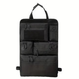 Black zipped seat back organiser laid flat, showing four zipped pouches and the side bottle sleeve