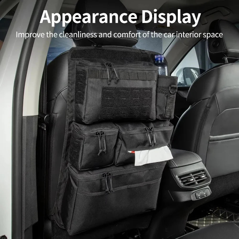 Black zipped seat back organiser with tissues pulled through the slot in the middle pouch