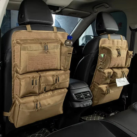 Two tan zipped seat back organisers on the front seats of a car