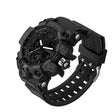 All-black watch at three-quarter angle with blacked-out dial, bezel and strap