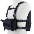 Black chest rig and flatpack worn on a mannequin, harness straps and buckles visible
