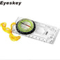 Eyeskey branded shot of the green-dial compass with its yellow neck lanyard