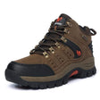 Single brown suede hiking boot with orange trim, outer side view on white