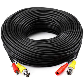 Large loose coil of black CCTV cable with BNC and DC connectors at both ends