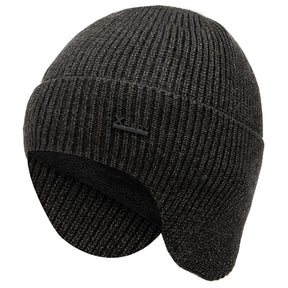 Dark grey wool beanie shown from the side with the earflaps down and the fleece lining just visible at the edge