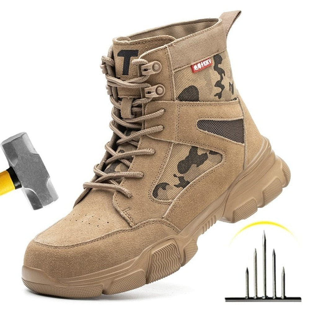 Studio shot of the tan camo work boot with a hammer and upright nails graphic